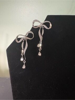 Cato Silver Bow Drop Earrings with Dangling Crystal Teardrops